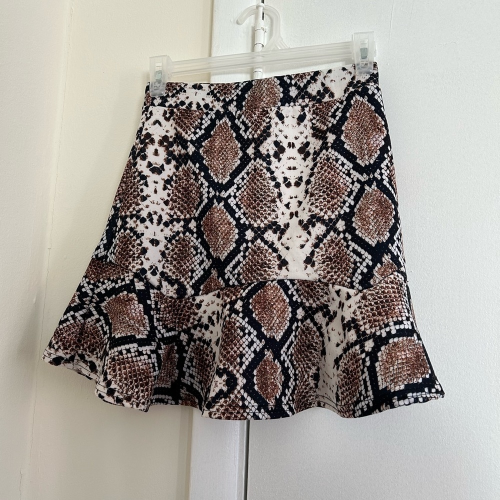 Lightly worn snake print skirt